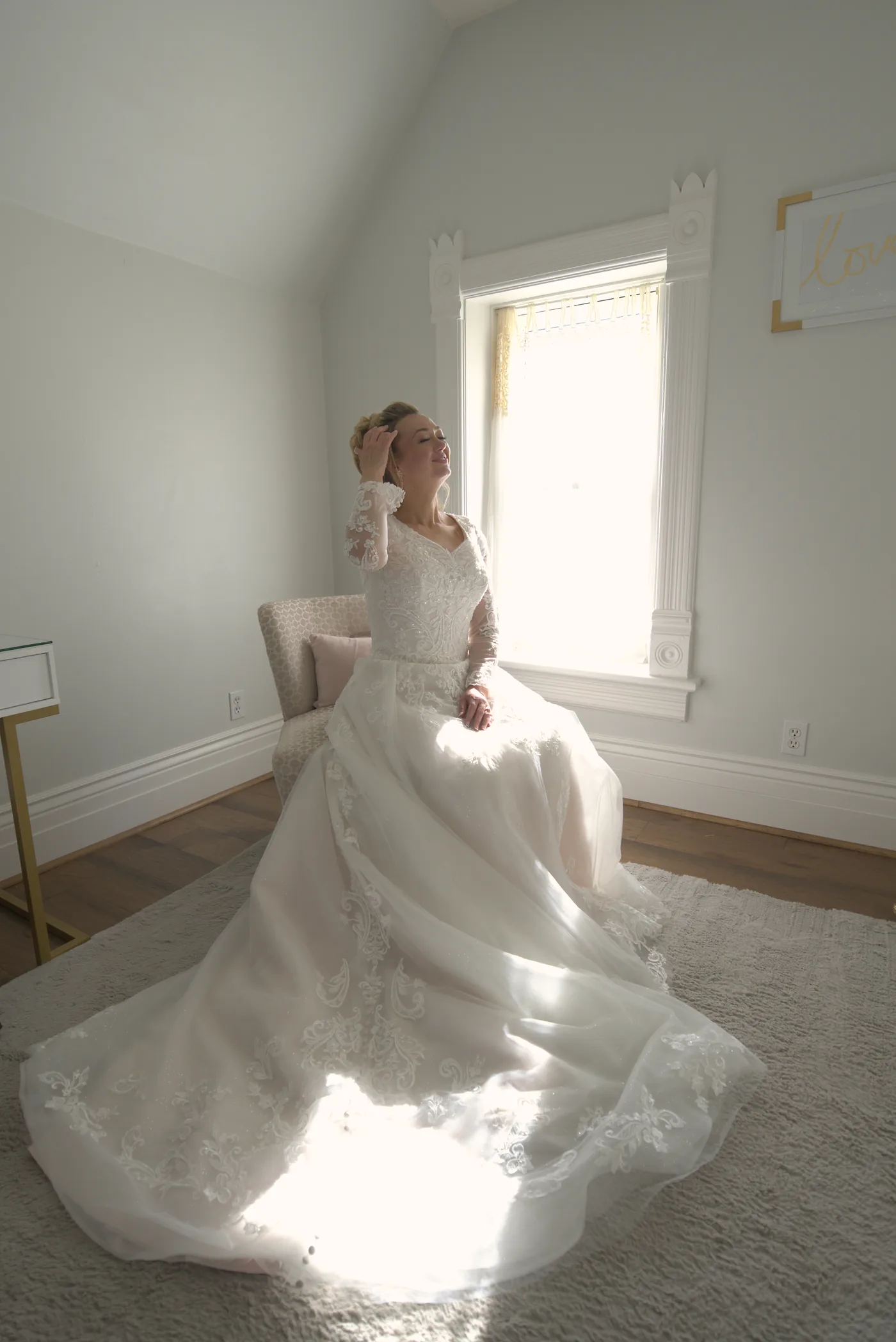 Bride by a bright window
